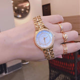 Michael Kors Lauryn Mother of Pearl White Dial Gold Steel Strap Watch for Women - MK3899 Authentic Buy Shop Now