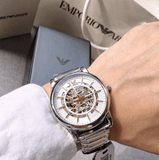 Emporio Armani Meccanico Skeleton Silver Dial Silver Steel Strap Watch For Men - AR1980 Authentic Buy Shop Now