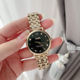 Coach Delancey Black Dial Gold Stainless Steel Strap Watch For Women - 14502813 Authentic Buy Shop Now