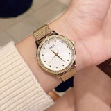 Guess Chelsea Mother of Pearl White Dial Gold Mesh Strap Watch For Women - W0647L3 Authentic Buy Shop Now