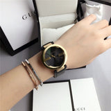 Gucci Interlocking G Gold Black Dial Black Leather Strap Unisex Watch - YA133326 Authentic Buy Shop Now