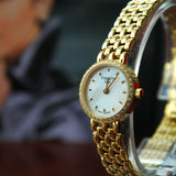 Tissot T-Lady Lovely Mother of Pearl Dial Gold Steel Strap Watch For Women - T058.009.63.116.00 Authentic Buy Shop Now