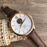 Tissot Tradition Powermatic 80 Open Heart Silver Dial Brown Leather Strap Watch For Men - T063.907.36.038.00 Authentic Buy Shop Now
