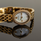 Tory Burch Oval Mother of Pearl Dial Gold Steel Strap Watch for Women - TBW6034 Authentic Buy Shop Now