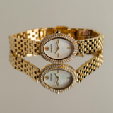 Tory Burch Oval Mother of Pearl Dial Gold Steel Strap Watch for Women - TBW6034 Authentic Buy Shop Now