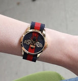 Gucci G Timeless Bee Red & Blue Dial Red Two Tone Nylon Strap Watch For Men - YA1264061 Authentic Buy Shop Now