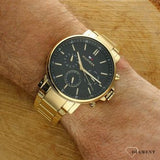 Tommy Hilfiger Tyson Chronograph Black Dial Gold Steel Strap Watch For Men - 1710589 Authentic Buy Shop Now